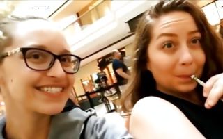 Two naughty young bitches nicely posing in public places